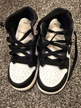 Jordan Kids Black and White High-Top Sneakers